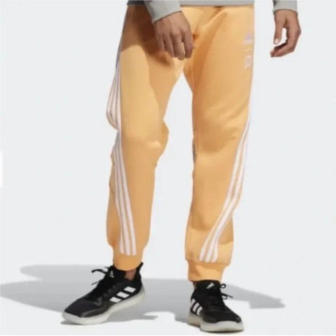 adidas x Peloton Unisex Go Retro Jogger Track Pant, Orange