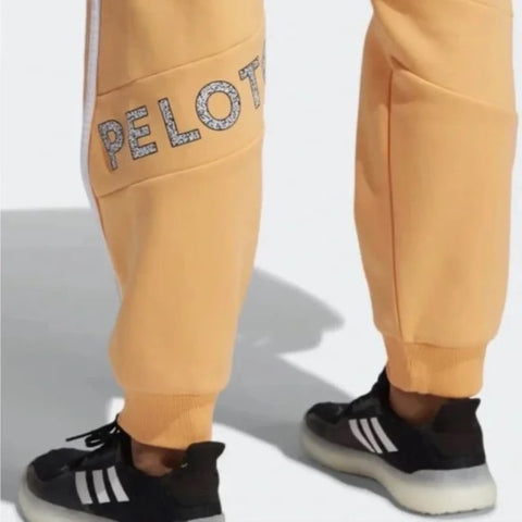 adidas x Peloton Unisex Go Retro Jogger Track Pant, Orange