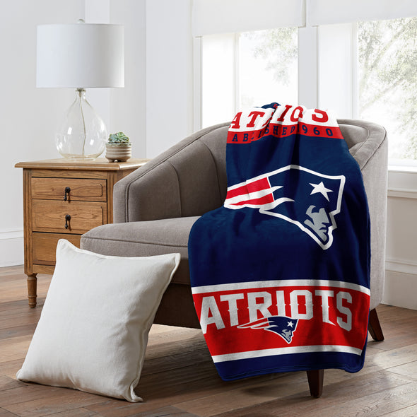 Northwest NFL New England Patriots Raschel Throw Blanket