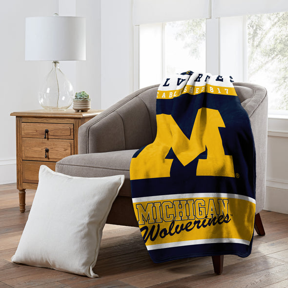 Northwest NCAA Michigan Wolverines Raschel Throw Blanket