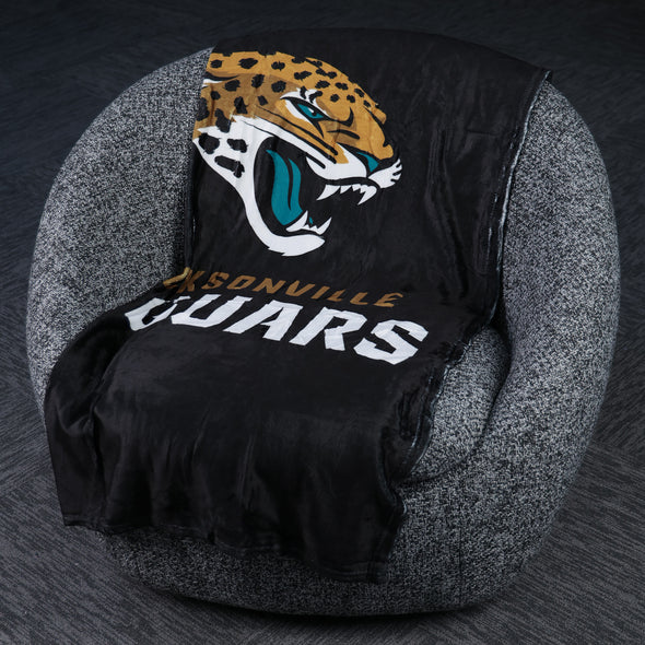 FOCO NFL Jacksonville Jaguars Plush Soft Micro Raschel Throw Blanket, 50 x 60